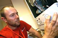 Propertycare staff member checking a central heating boiler