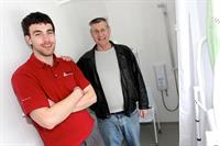 Propertycare staff member with a customer following some aids and adaptations work